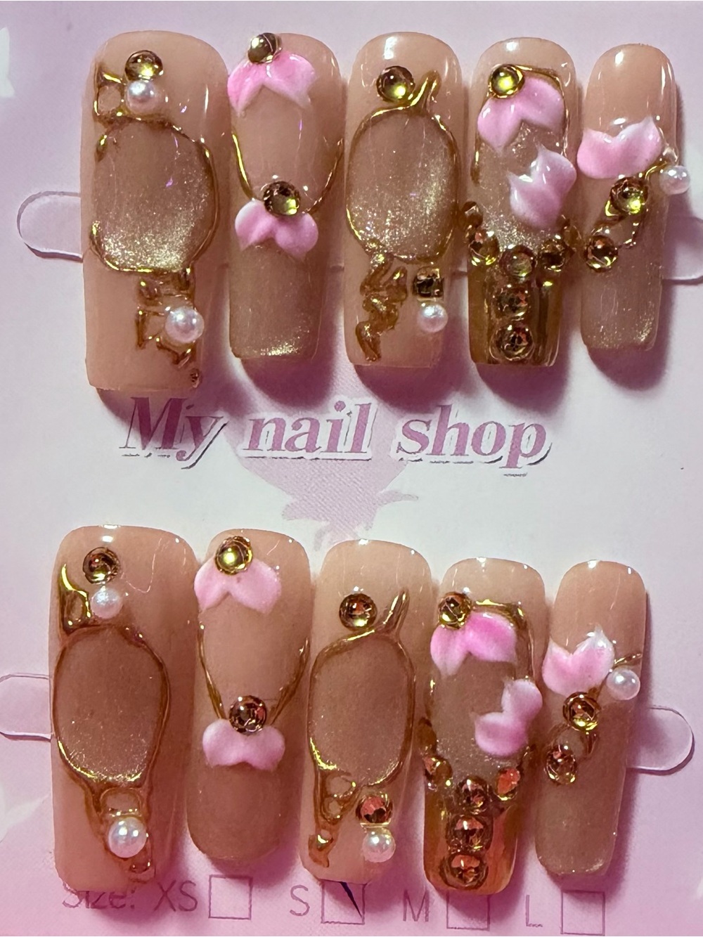 Elegant Pink Bow Nude Press-On Nails with Gold & Pearl Accents